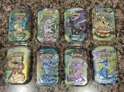 Pokemon Prismatic Evolutions Mini Tin Set of 8 Eeveelutions - Image 1