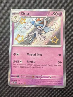 Pokemon TCG Kirlia Holo Card Paldean Fates SV 154/091 NM Shiny Rare - Image 1