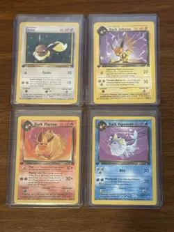 Eevee, Dark Flareon, Dark Jolteon, Dark Vaporeon - Team Rocket 1st Edition NM - Image 1