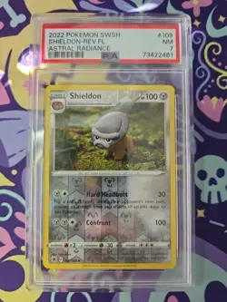 Pokemon TCG Sword & Shield Astral Radiance Reverse Holo Shieldon 109 PSA 7 NM - Image 1