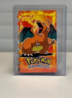1999 TOPPS POKEMON #06 CHARIZARD EVOLUTION EMBOSSED DIE CUT BLUE LOGO - Image 1
