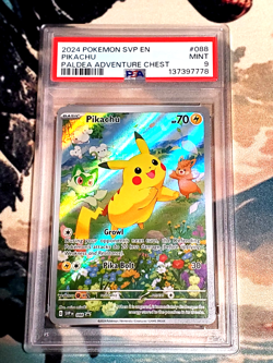 Pikachu Black Star Promo SVP088 PSA 9 MINT - 2022 Pokemon Paldean Adventure Tin - Image 1