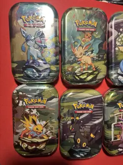 Pokemon TCG Prismatic Evolutions Mini Tin Complete Set - 8 Factory Sealed Tins - Image 2