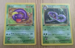 Pokemon 1st Edition Arbok 31/62 and Ekans 46/62 Fossil LP - Image 1
