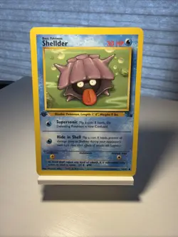 1999 POKEMON SHELLDER #54/62 1ST EDITION FOSSIL - Image 1