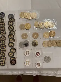 Lot of Metal Pokemon Coins, And Condition Markers (Charizard UPC x2 included) - Image 1
