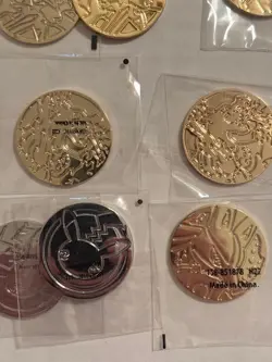Lot of Metal Pokemon Coins, And Condition Markers (Charizard UPC x2 included) - Image 3