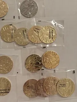Lot of Metal Pokemon Coins, And Condition Markers (Charizard UPC x2 included) - Image 4
