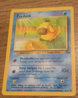 Psyduck 53/62 Fossil Regular WOTC Pokemon Card - Image 1
