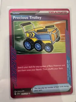 2025 Pokemon Pokemon TCG Precious Trolley 185/191 Sv08: Surging Sparks Holo Card - Image 1