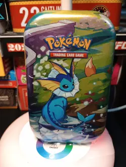 Pokemon Prismatic Evolutions Mini Tin Vaporeon Sealed 2 Booster Packs - Image 1