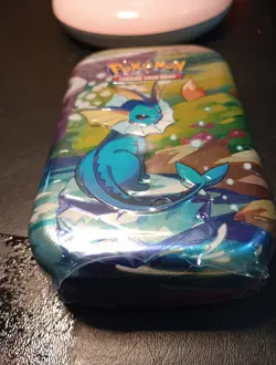 Pokemon Prismatic Evolutions Mini Tin Vaporeon Sealed 2 Booster Packs - Image 2