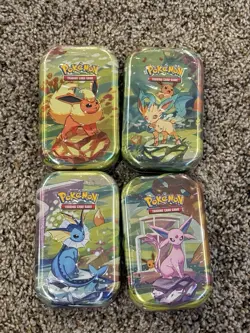 Lot of (4) Pokemon TCG Scarlet & Violet Prismatic Evolutions Mini Tins SEALED - Image 1