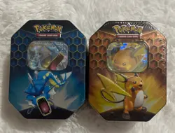 Pokemon TCG Hidden Fates Tins (1 Gyarados 1 Raichu) - Image 1