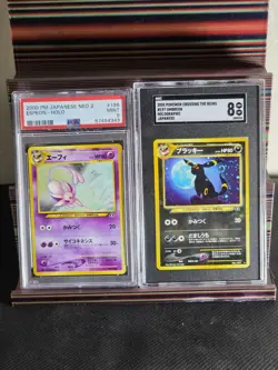 2000 Pokemon JPN Crossing the Ruins Espeon & Umbreon (PSA 9 & SGC 8) With SWIRL - Image 1