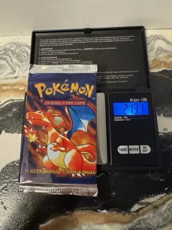 21.31g Heavy 1999 Pokemon Charizard Art Base Set Booster Pack - Image 1