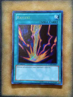 Yugioh Raigeki LCJW-EN057 Secret Rare 1st Ed LP - Image 1