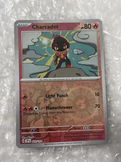Pokemon TCG Charcadet 033/191 Sv08: Surging Sparks Reverse Holo NM - Image 1