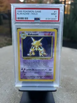 1999 POKEMON BASE SET UNLIMITED #1 ALAKAZAM-HOLO PSA 9 MINT - Image 1