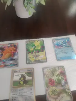 Lot (5) Pokemon Cards: Sprigatito #196 I.R MINT, Charizard GX SM211 MP, Vaporeon - Image 1