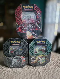 Pokemon TCG Paldean Fates Set of 3 Tins: Charizard, Iron Treads & Great Tusk! - Image 1