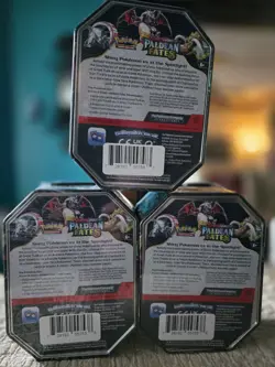 Pokemon TCG Paldean Fates Set of 3 Tins: Charizard, Iron Treads & Great Tusk! - Image 2