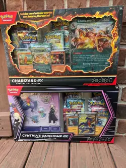 NEW-Pokemon TCG Cynthia's Garchomp Premium Collection Box & Charizard ex Box - Image 1