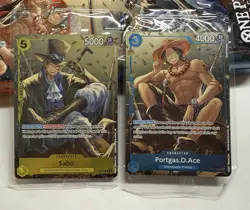 One Piece Sabo P-073 & Portgas.D. Ace P-074 Promo Card Sealed + 2 Empty Tins - Image 2