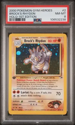 2000 POKEMON GYM HEROES BROCK’S RHYDON HOLO - 1ST EDITION #2 PSA 8 - Image 1