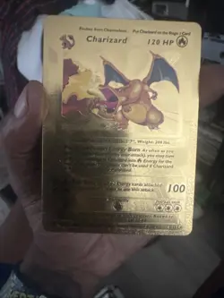 1999 Pokemon Charizard Gold Foil Textured Card 4/102 - Image 1