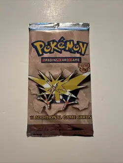 1999 Pokemon Fossil Booster Pack Zapdos Art Sealed Pristine Condition - Image 1