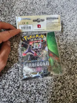 Pokemon TCG Sun & Moon Forbidden Light Mini Portfolio & Booster Pack - Image 2