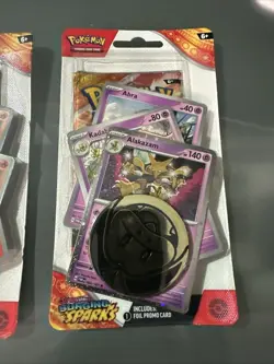 Pokemon TCG: Surging Sparks Checklane Blister Set, Alakazam & Chandelure - Image 3