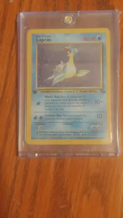 Pokemon Lapras Fossil 10/62 Holo Rare 1st Edition Card 1999 English TCG - Image 1