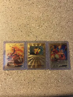 Pokemon TCG Textured Gold Foil, Fan Art Charizard, And Pikachu (lot Of 3 Cards) - Image 1