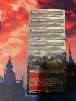 MTG Modern Horizons 3 Wooded Foothills Borderless x 4 - Image 1