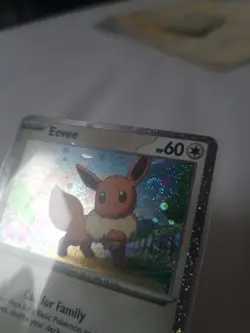 Pokemon TCG Evee Promo SVP043 Swirl NM LP - Image 1