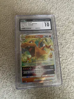 CGC 10 GEM MINT JAPANESE POKEMON 2022 CHARIZARD VSTAR 015/100 STAR BIRTH S9 - Image 1