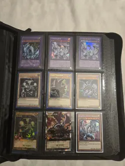 Yu-Gi-Oh! Binder Collection EST VALUE $839, Blue- Eyes White Dragon, etc - Image 1
