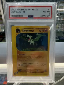 2003 POKEMON SKYRIDGE #1 AERODACTYL PSA 8 - Image 1