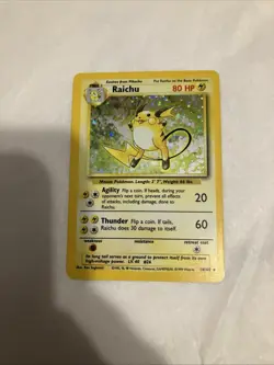 Pokemon TCG Base Set Raichu Holo Card 14/102 LP Condition 1 Little White Spot - Image 1
