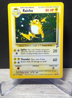 Pokemon TCG Raichu 14/102 Base Set 2 Holo Rare 1999 WOTC Vintage LP SWIRL - Image 1