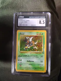 1999 POKEMON JUNGLE #9 PINSIR-HOLO CGC 8.5 - Image 1