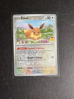 Eevee 074/131 Pokemon Day 2025 Reverse Cosmos Holo Card Stamped SWSH PTCG NM - Image 1