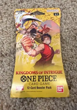 One Piece KINGDOMS OF INTRIGUE English Sleeved Booster OP-04 Sealed 12-Card Pack - Image 1