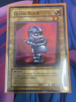 YuGiOh - Ojama Black - DP2-EN004- 1st Edition - LP MISPRINT Red ink smear error - Image 1