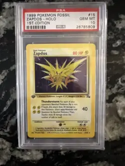 1999 POKEMON FOSSIL 1ST ED #15 ZAPDOS - HOLO PSA 10 - Image 1