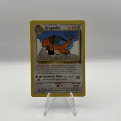 1999 Dragonite WB The First Movie Stamp Black Star Promo 5 Pokemon Card - Image 1