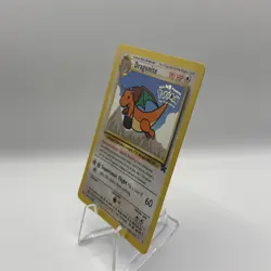 1999 Dragonite WB The First Movie Stamp Black Star Promo 5 Pokemon Card - Image 3