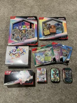 Pokemon - Prismatic Evolutions - ETB, Binder, Surprise Box, Booster Bundle, Tins - Image 1